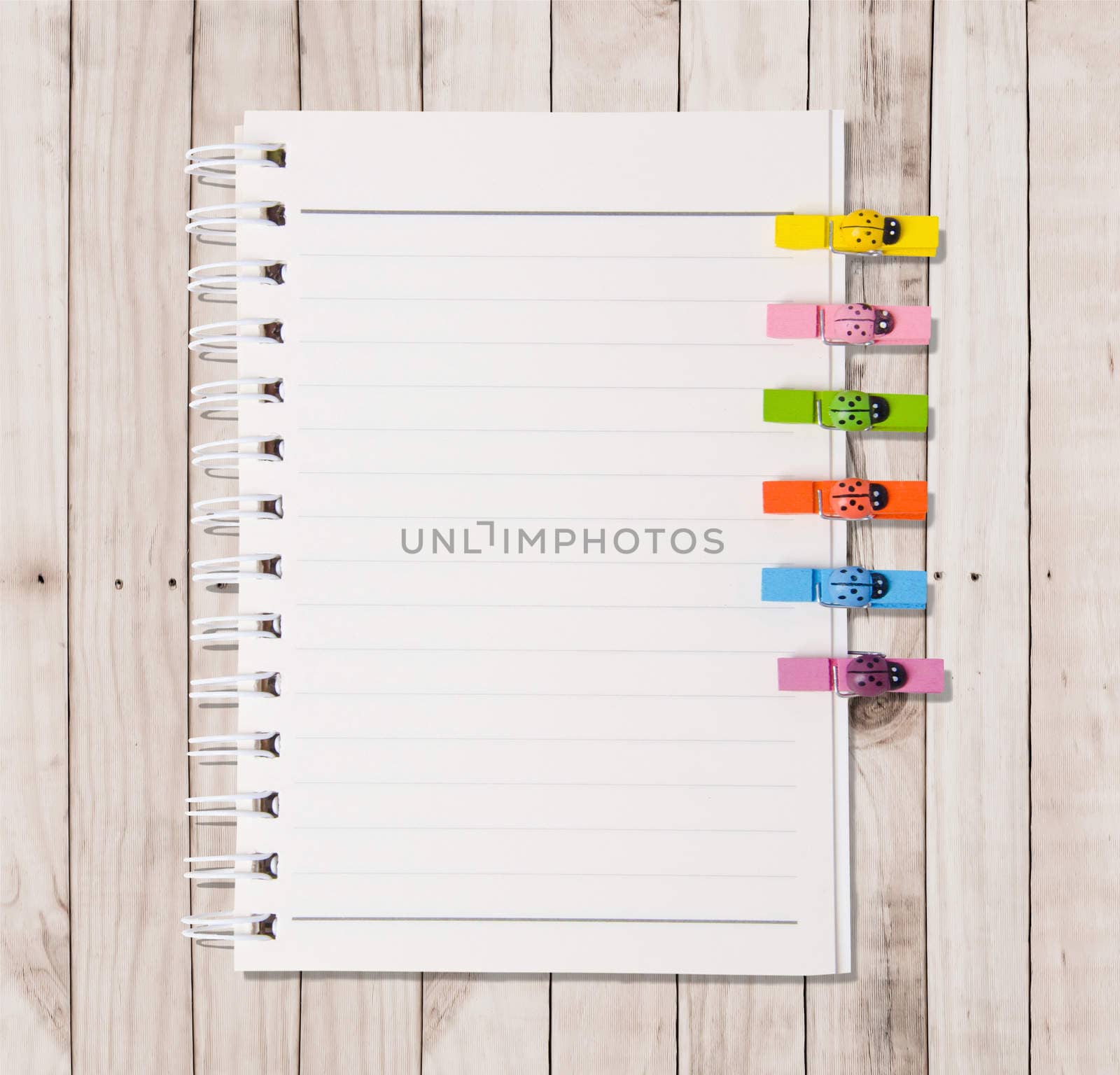 White Note Book Blank Page on Wood Table