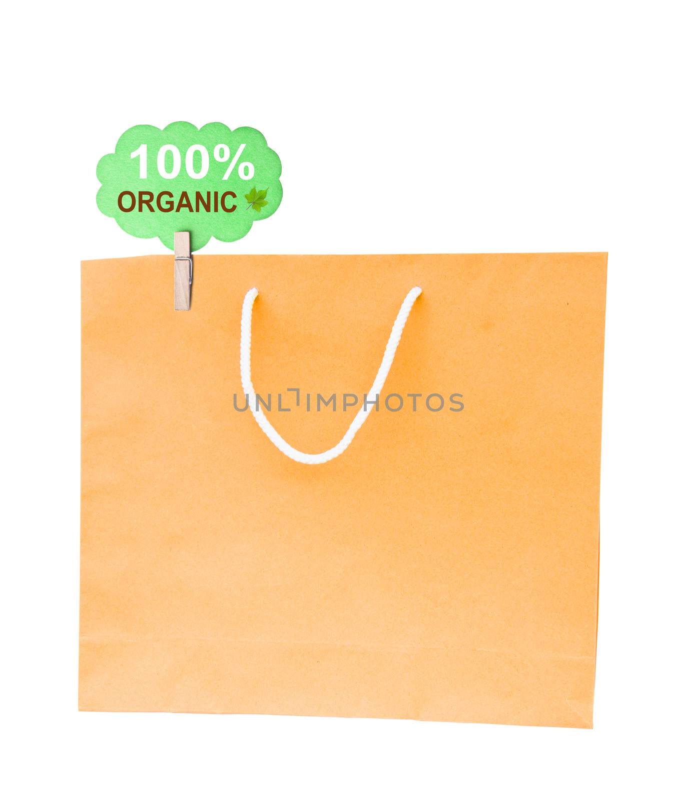 Blank brown paper bag isolated on white background. 100% Organic