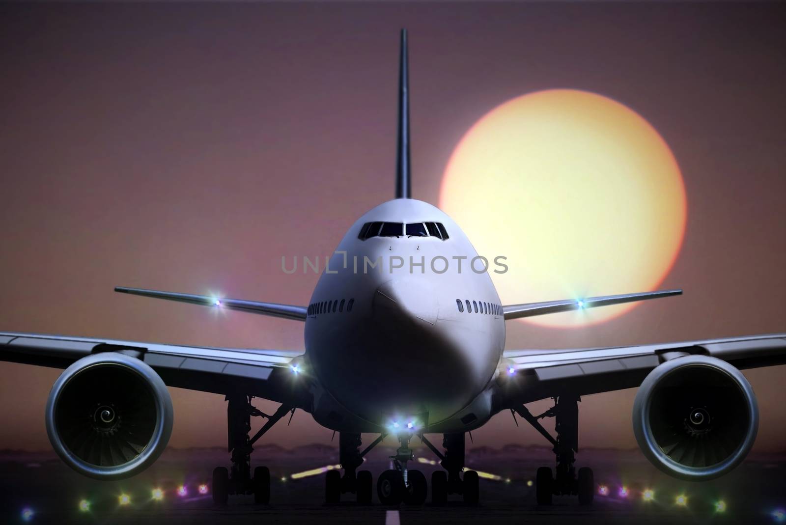 Airplane on runaway during sunset by razihusin