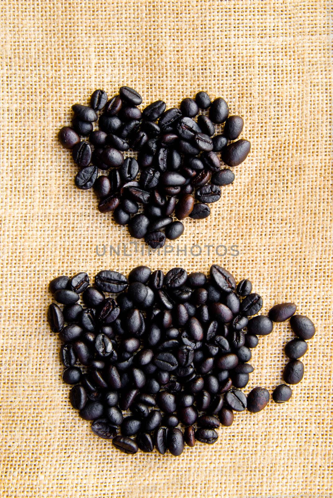coffee grains on sack background
