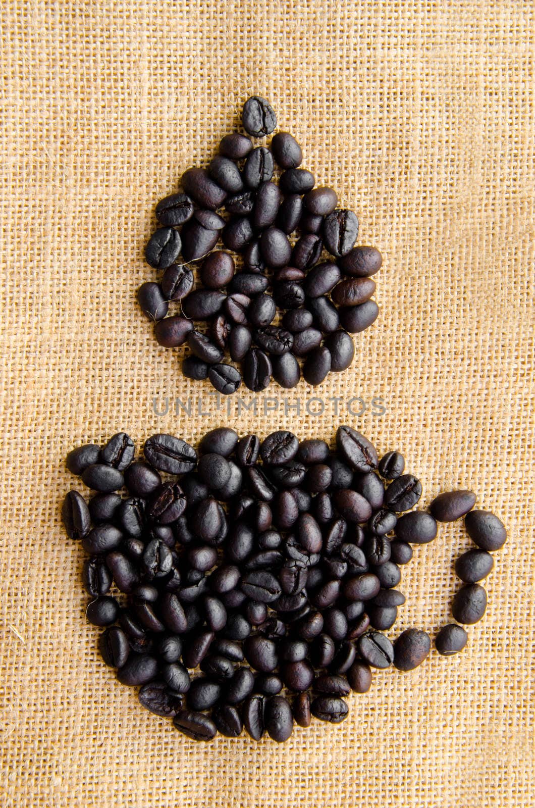 coffee grains on sack background
