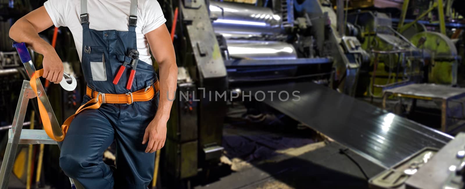 Worker with instruments at industrial factory