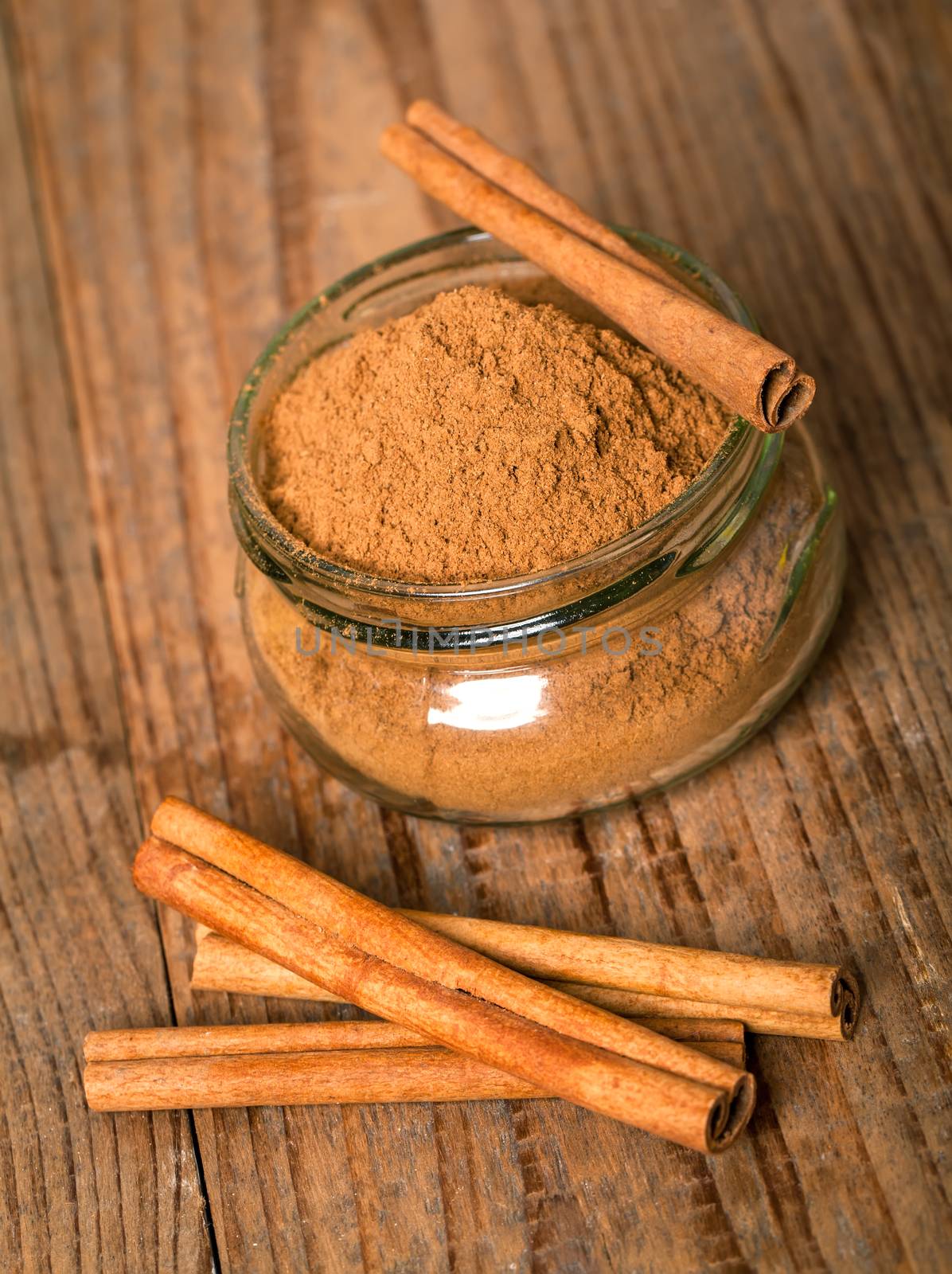 cinnamon, or chinese cinnamon in the transparent glass jar with  by motorolka