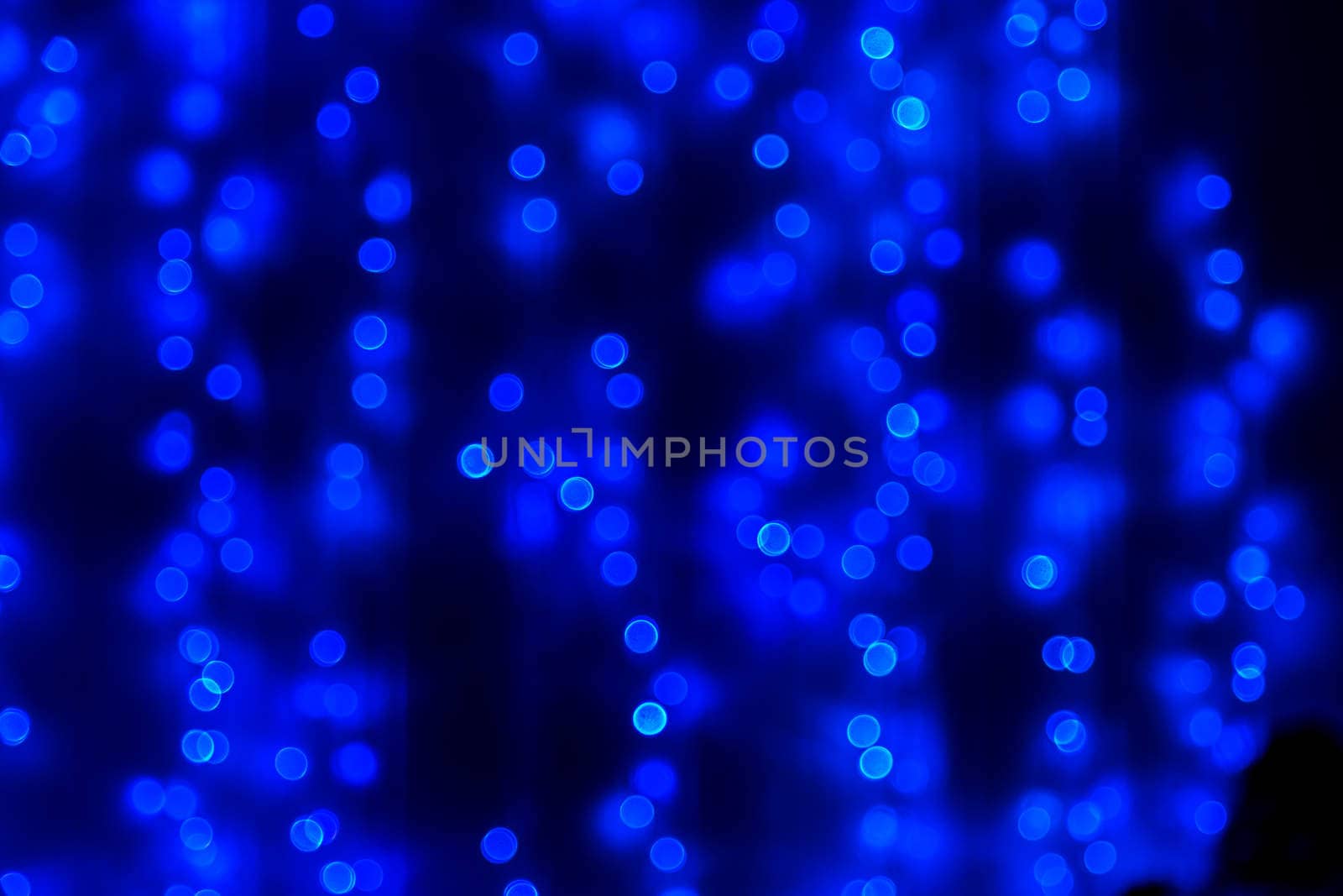 Blue glitter bokeh lights bokeh defocused background