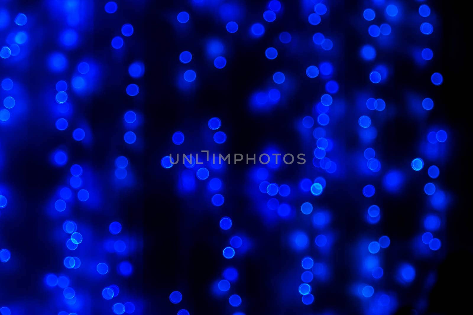 Blue glitter bokeh lights bokeh defocused background