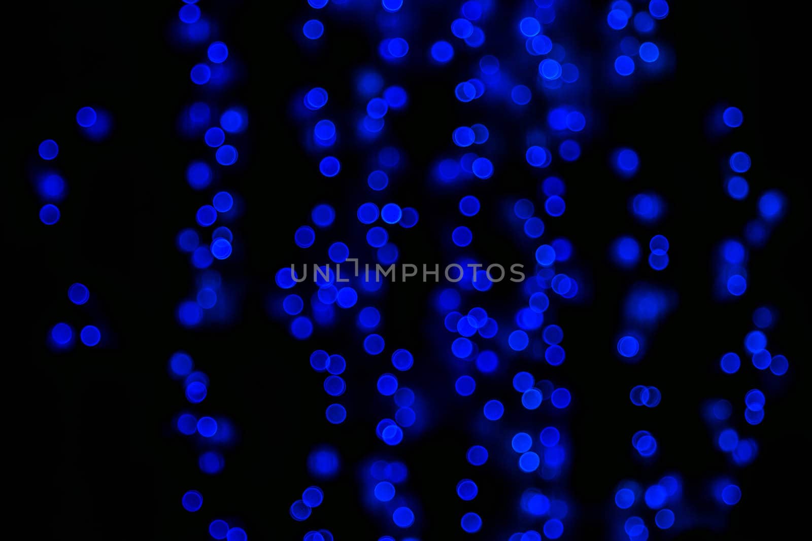 Blue glitter bokeh lights bokeh defocused background