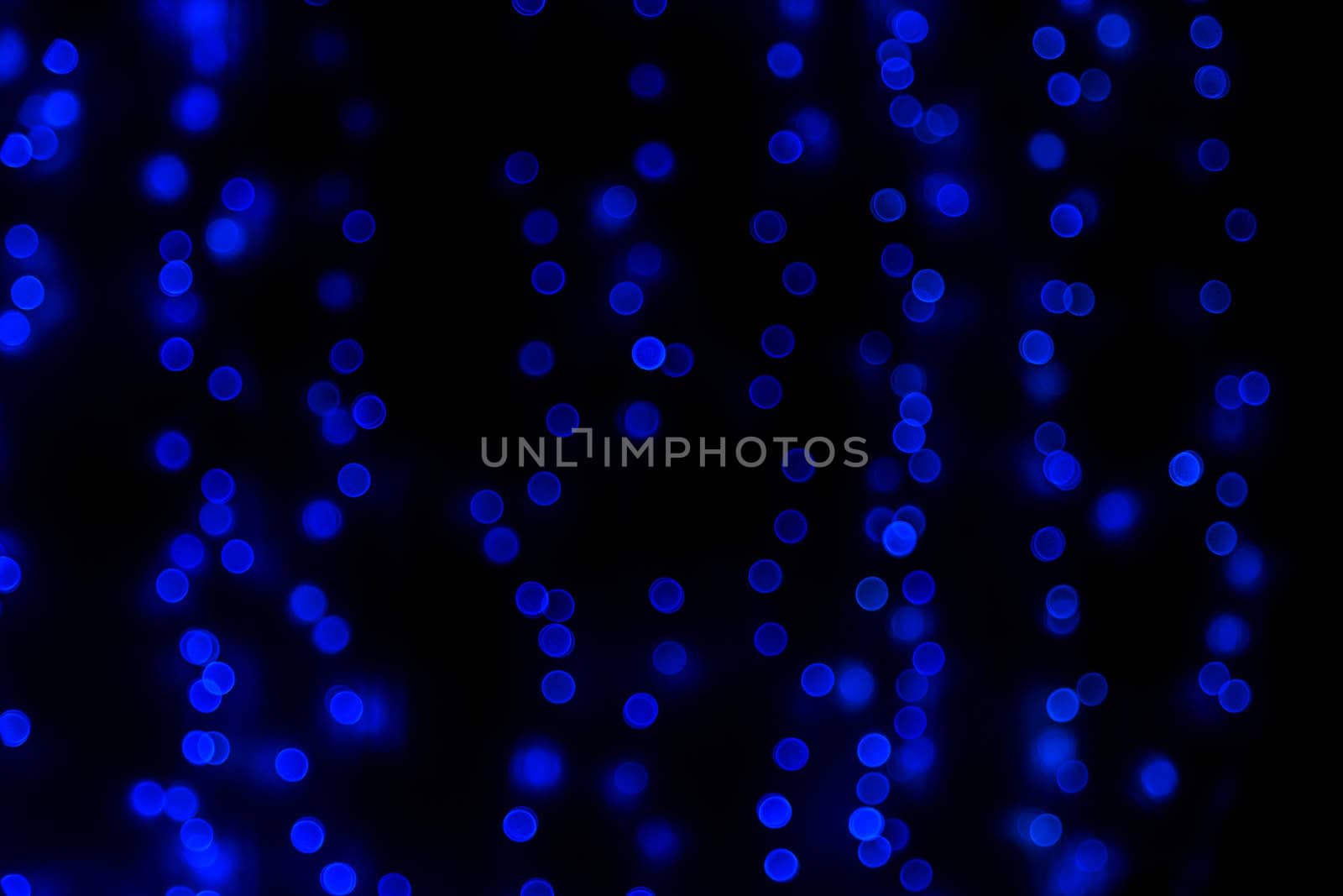 Blue glitter bokeh lights bokeh defocused background