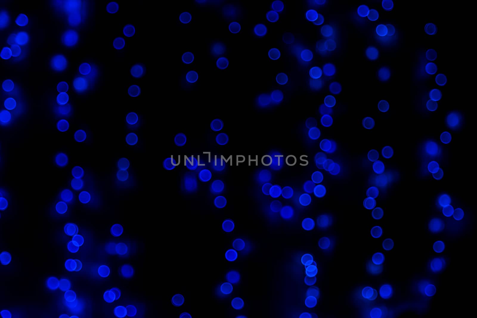 Blue glitter bokeh lights bokeh defocused background