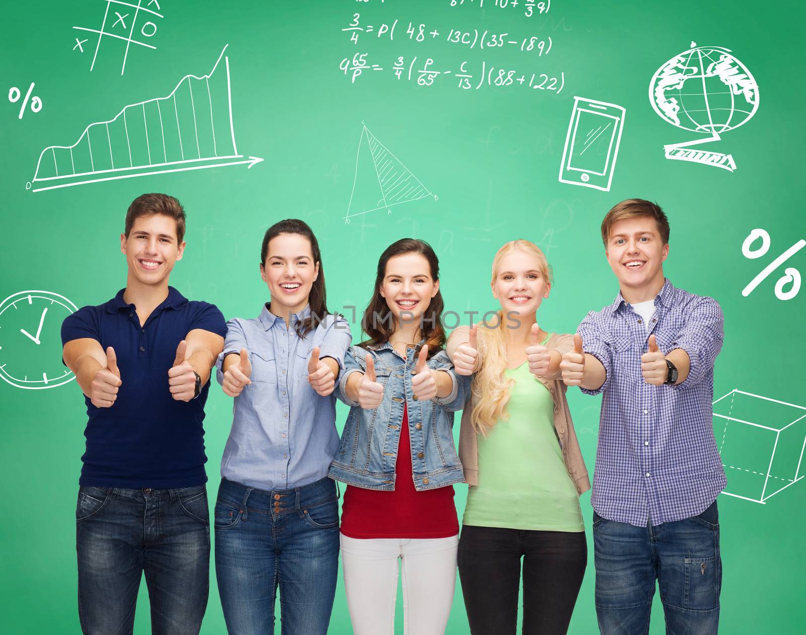 education, friendship, gesture, and people concept - group of smiling students standing and showing thumbs up over green board