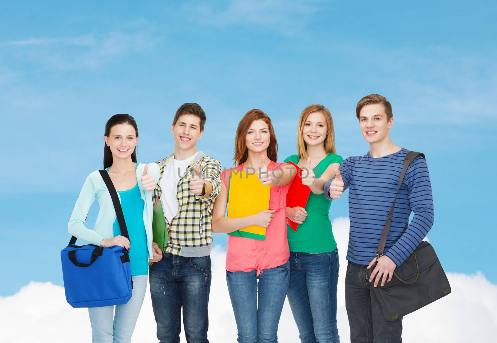 education and people concept - group of smiling students standing