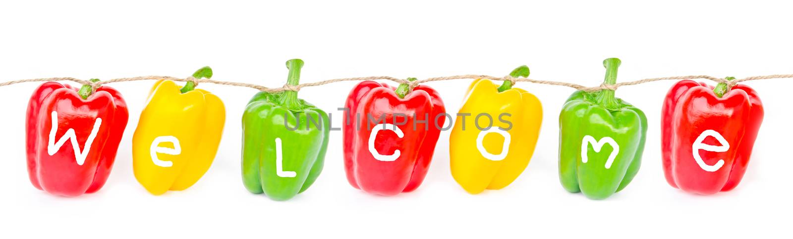 welcome wording on bell peppers, isolated on white background