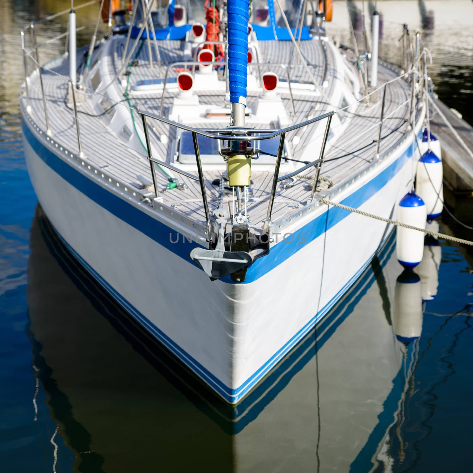 White sailing boat in a harbour