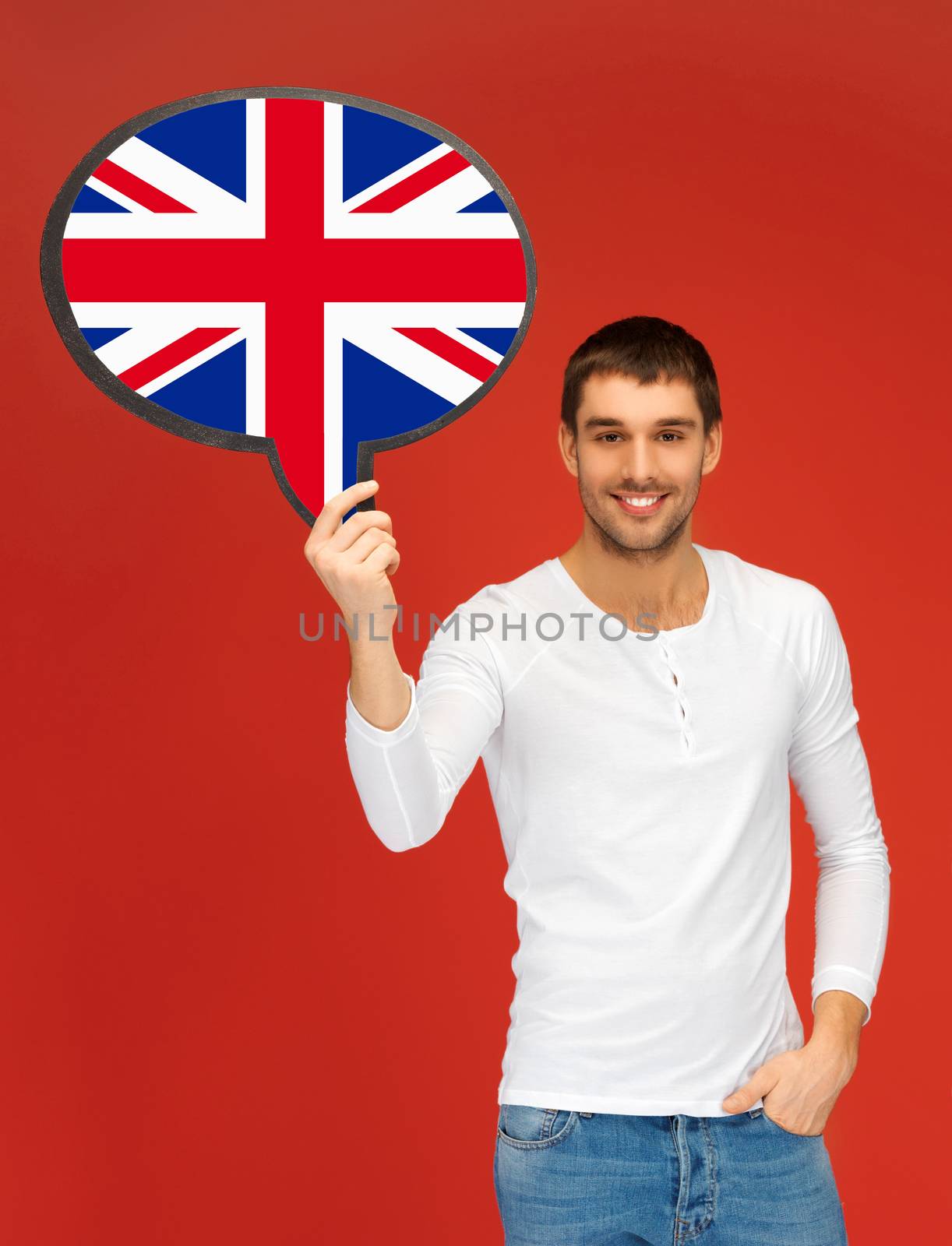 education, fogeign language, english, people and communication concept - smiling young man holding text bubble of british flag