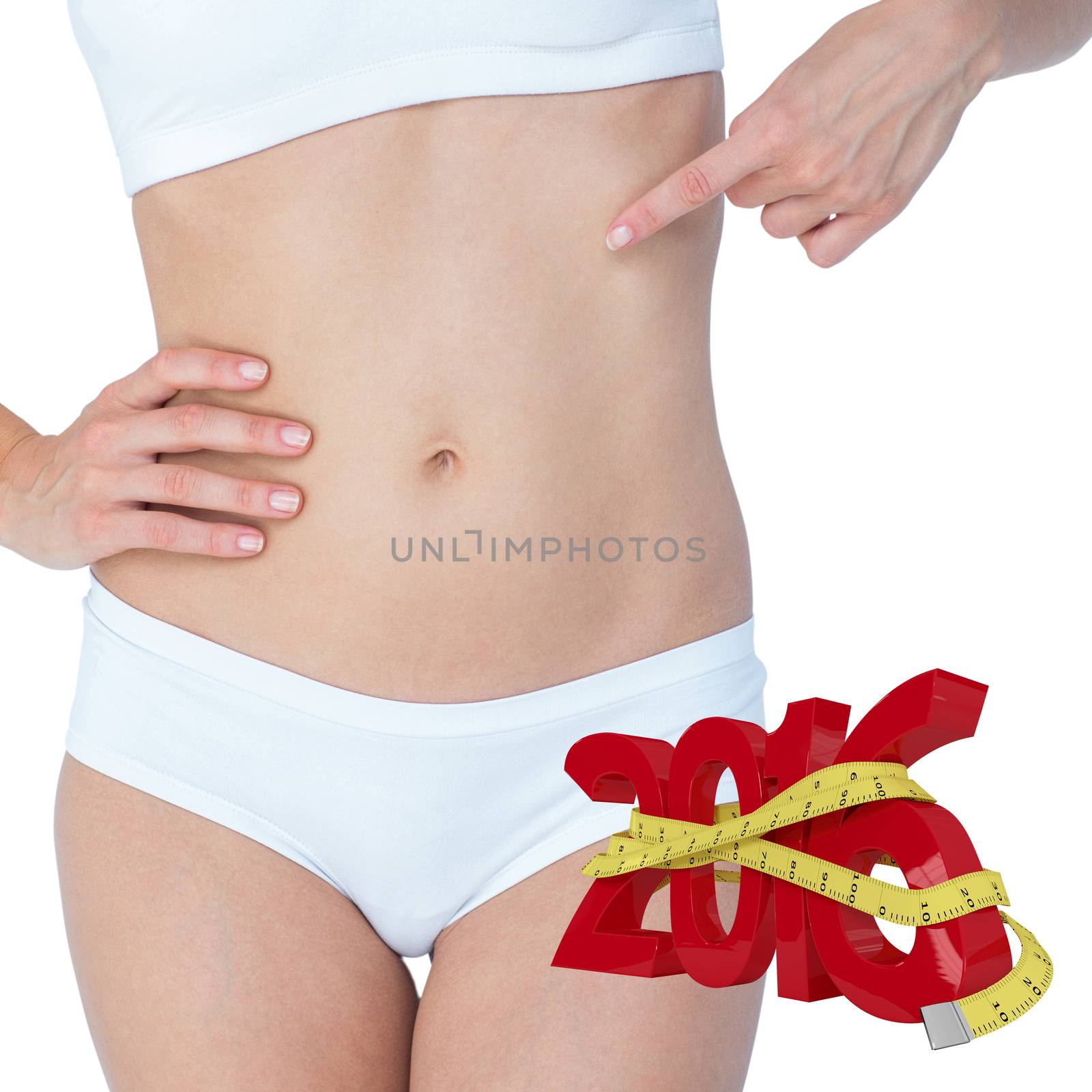 Composite image of attractive woman pointing her belly  by Wavebreakmedia