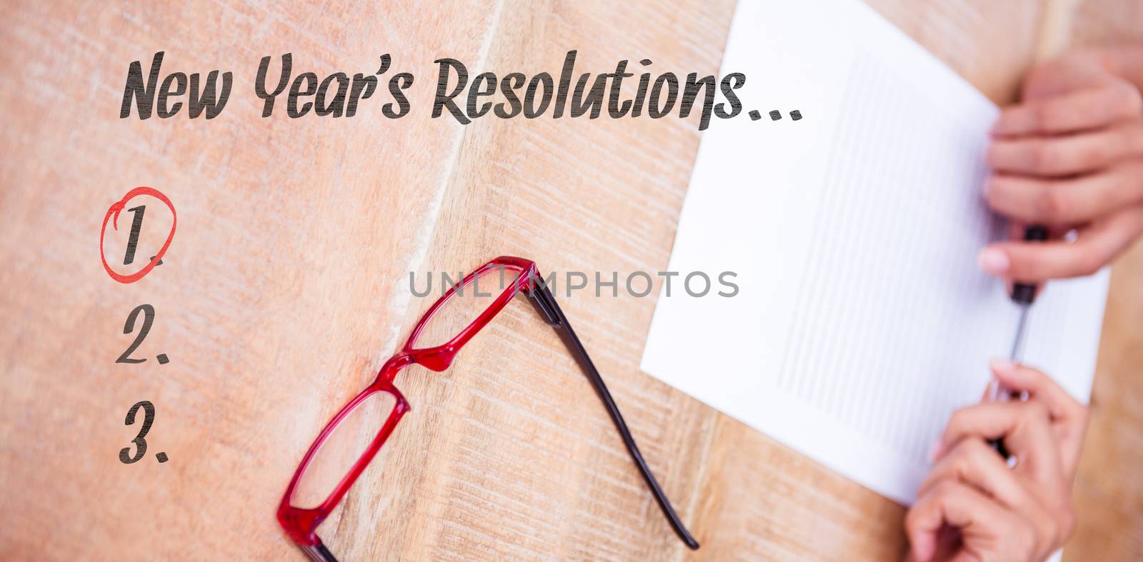 New years resolution list against close up view of a piece of paper
