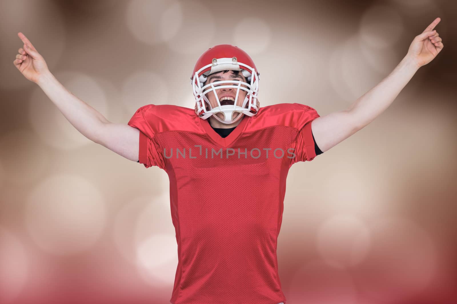 Composite image of a triumph of an american football player  by Wavebreakmedia