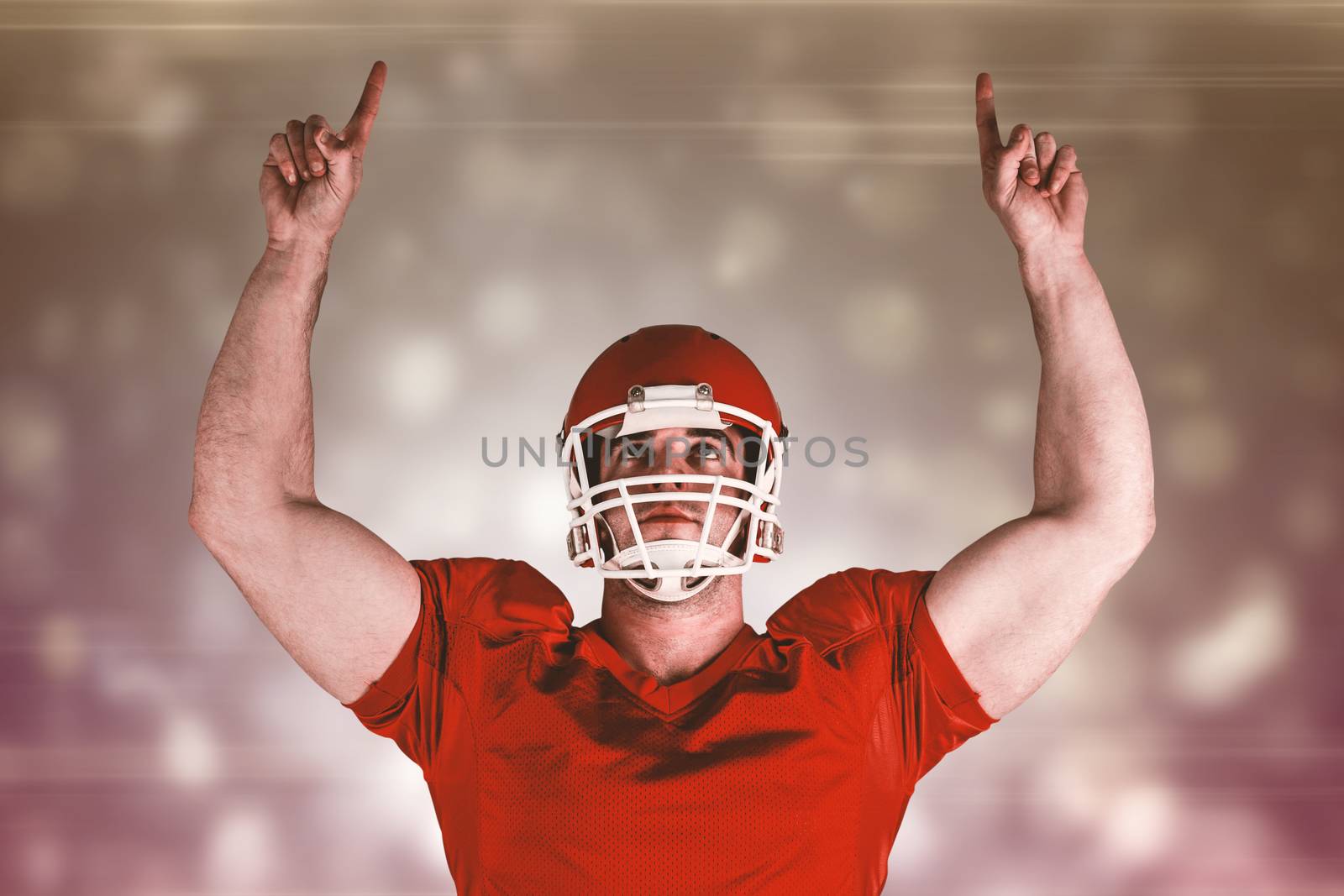 Composite image of american football player cheering by Wavebreakmedia