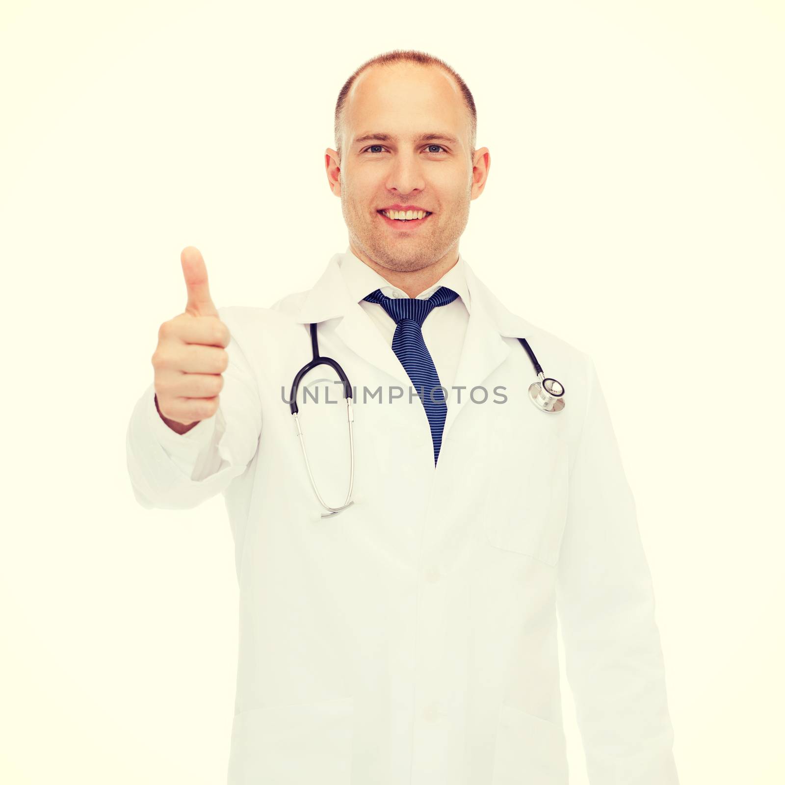 smiling doctor with stethoscope showing thumbs up by dolgachov