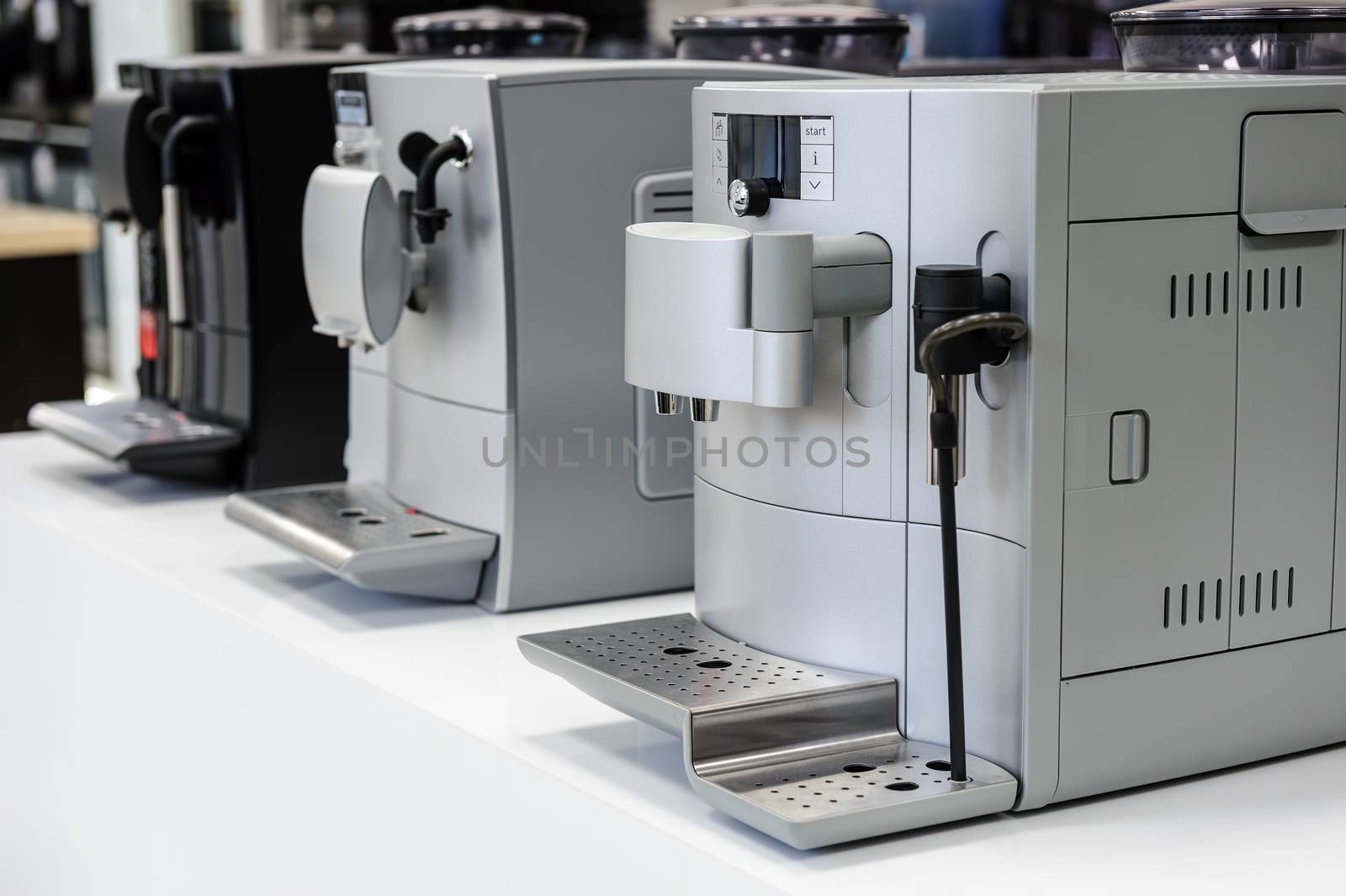 row of coffee machines by starush