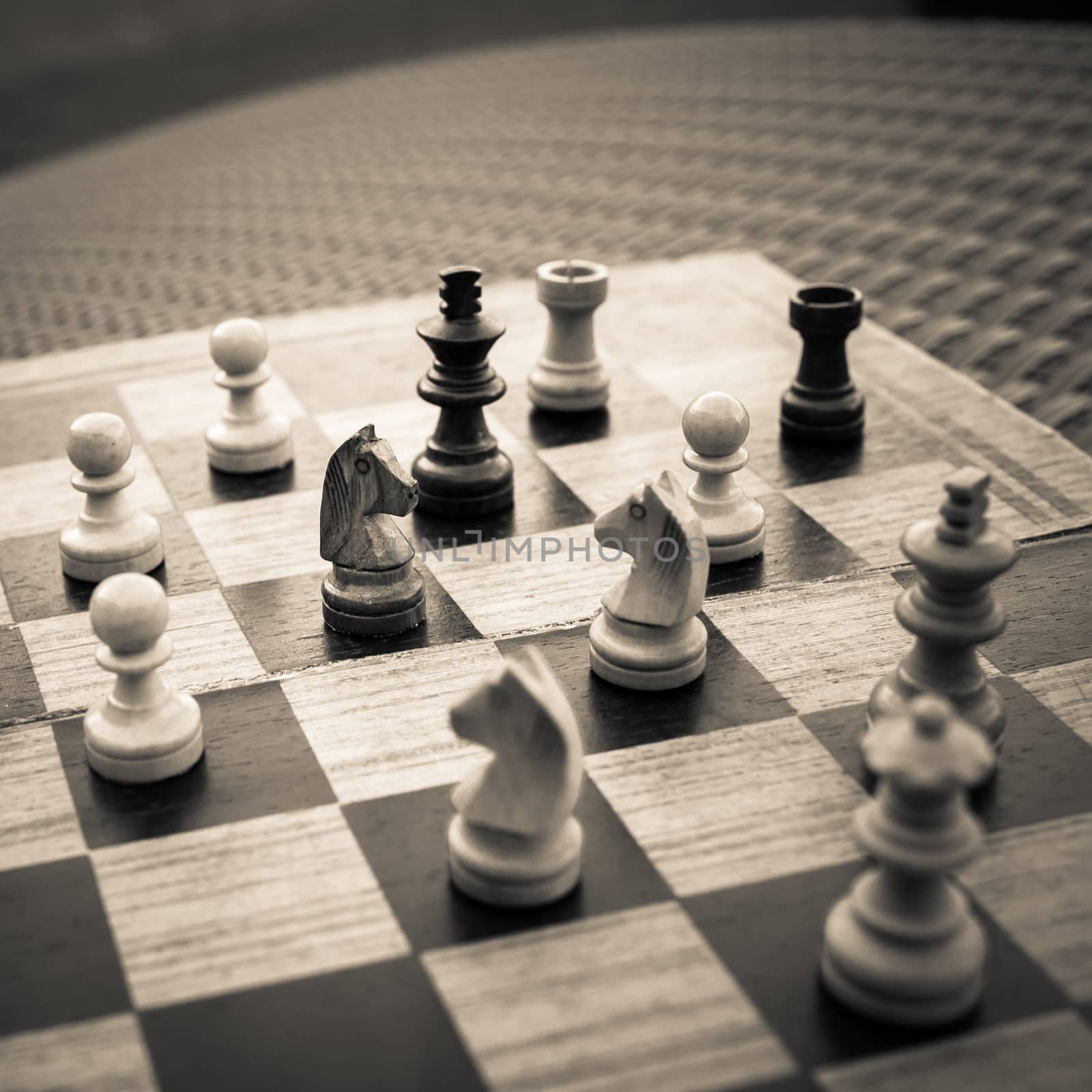 Wooden Chess board Business strategy idea concept background. Vintage dark corner style .