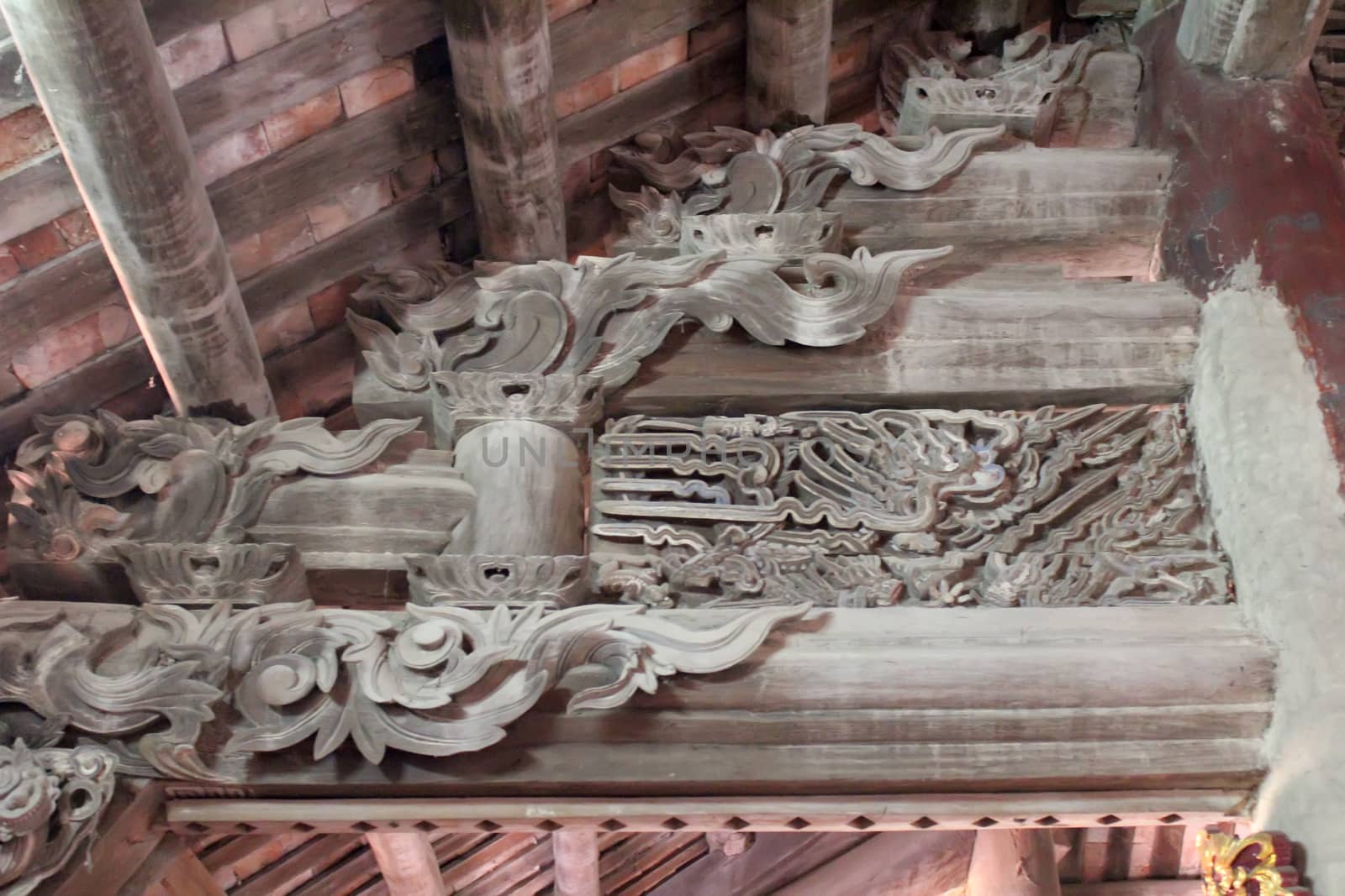 Ancient pattern on wood in vietnam temple