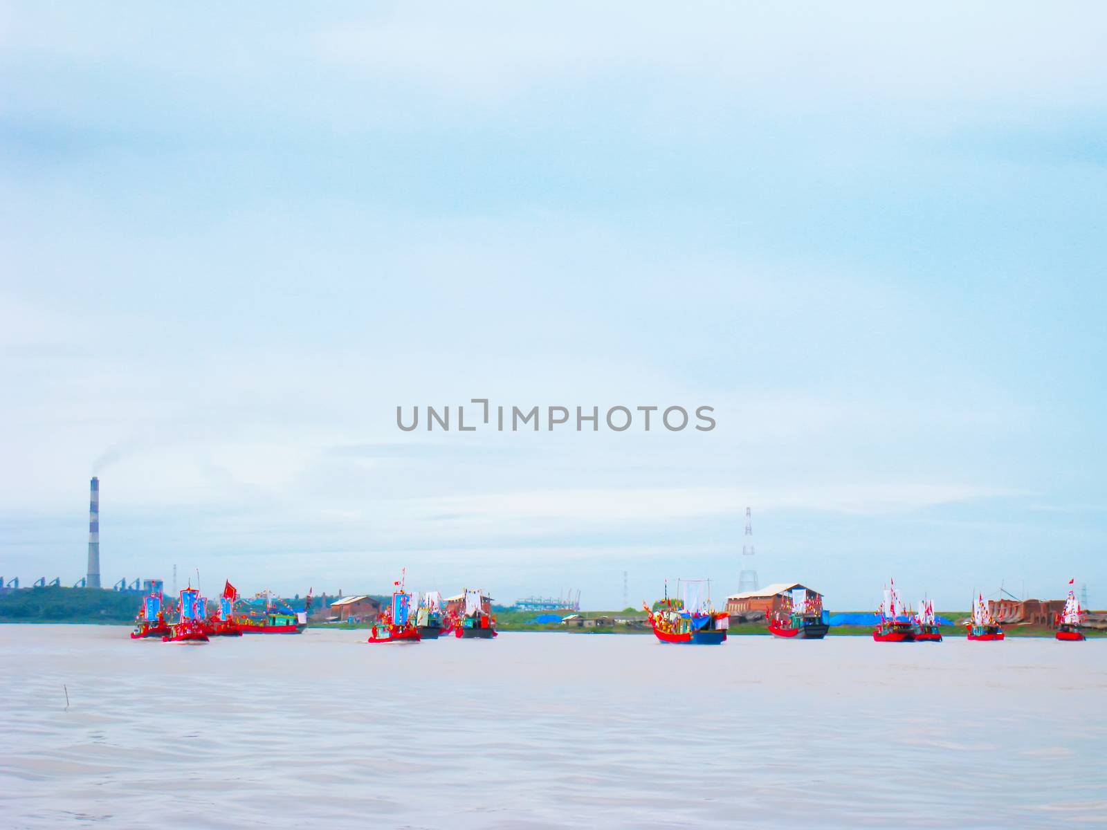 HAI DUONG, VIETNAM, March 2: Performed traditional boat on the Luc Dau river on March 2, 2013 in Kiep Bac – Con Son festival, Chi Linh, Hai Duong, Vietnam. Kiep Bac – Con Son festival is the most traditional festival, unique in Vietnam, held in spring and autumn every year. Perform traditional boat to recreate the naval battle in the history of the 14th century of Tran Hung Dao, a national hero of Vietnam, 1 in 10 of the world's great general by the Science Council of British Royal considered for February 1984