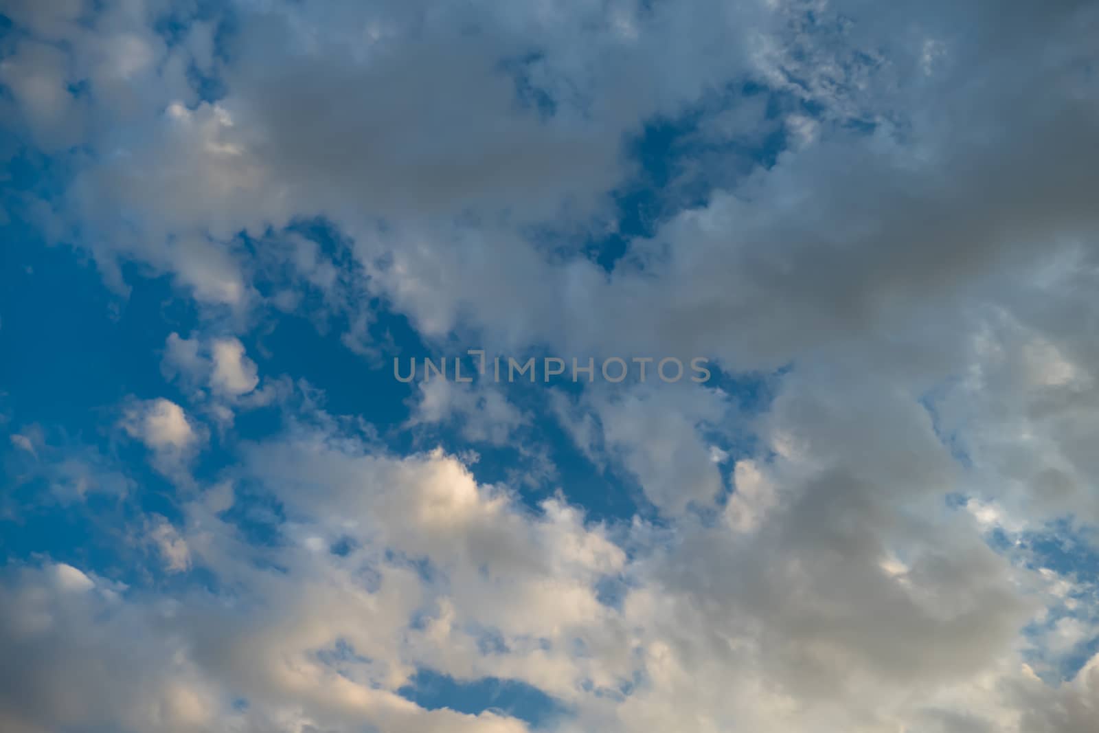 Cloudy blue sky abstract background by teerawit