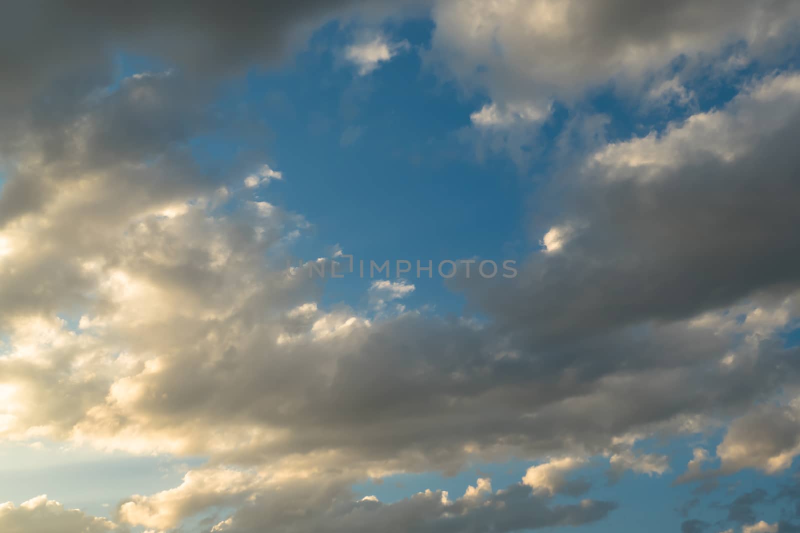 Cloudy blue sky abstract background by teerawit