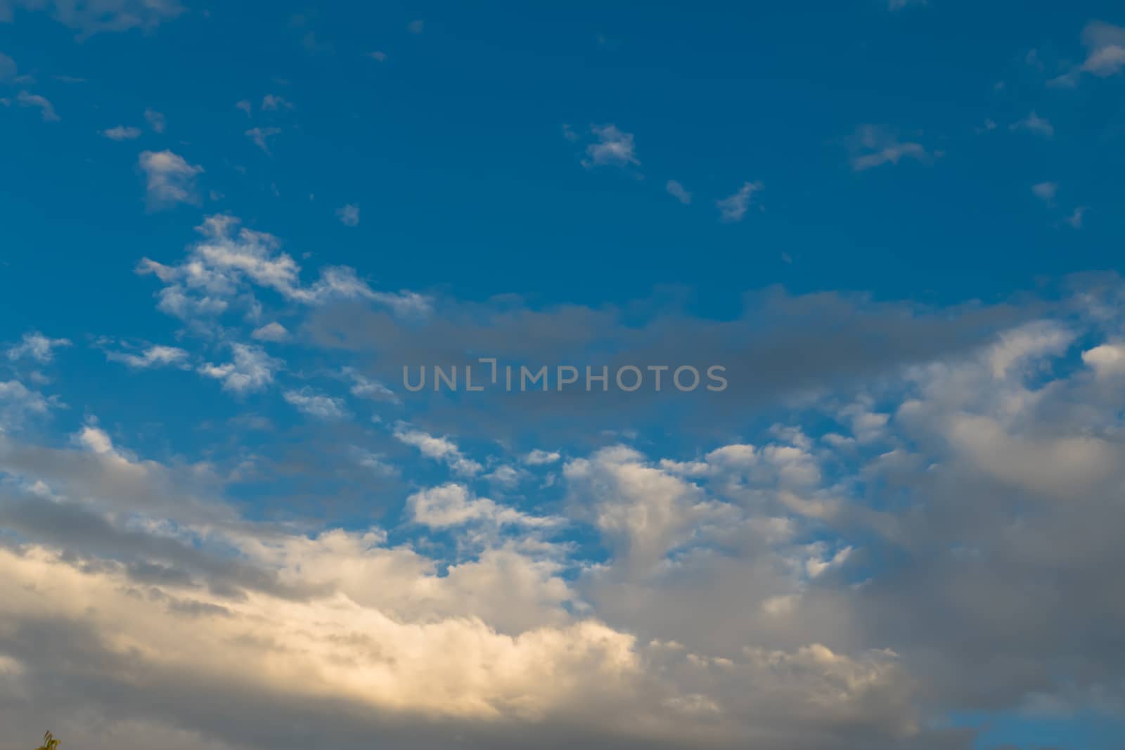 Cloudy blue sky abstract background by teerawit