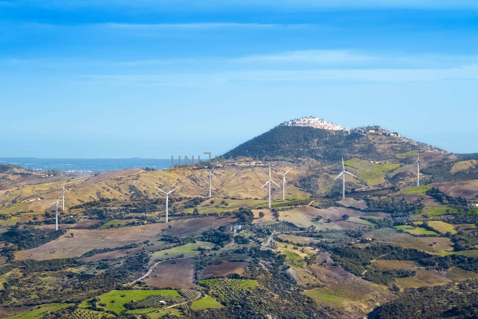 wind turbine renewable energy source on landscape by donfiore