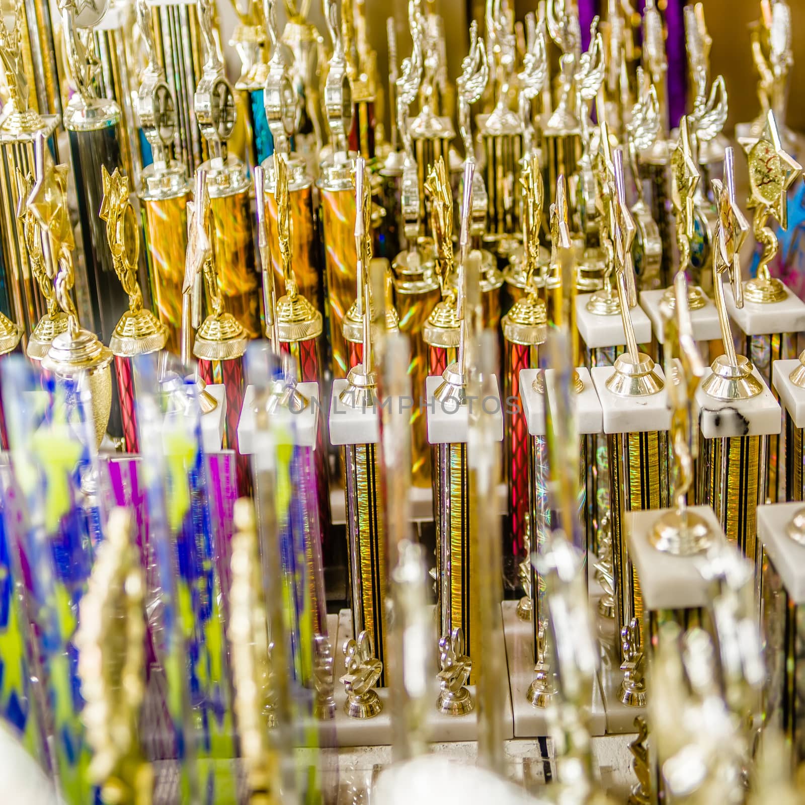 champion trophies abstract on shelf display by digidreamgrafix