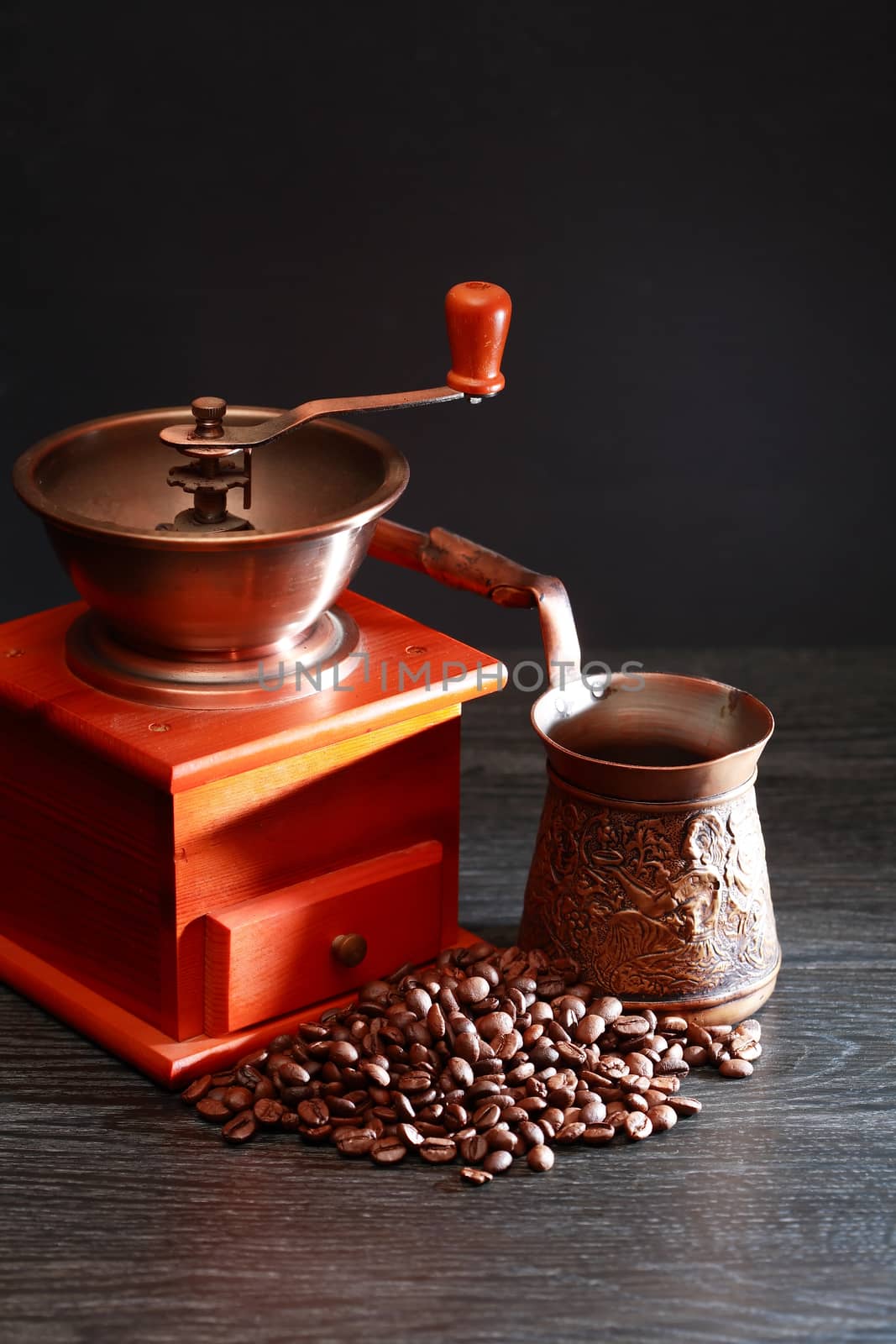 Coffee beans and vintage equipment for coffee preparation