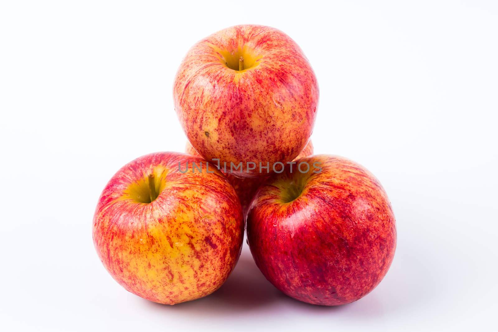 Image of group of red apples in white background. Good for health .