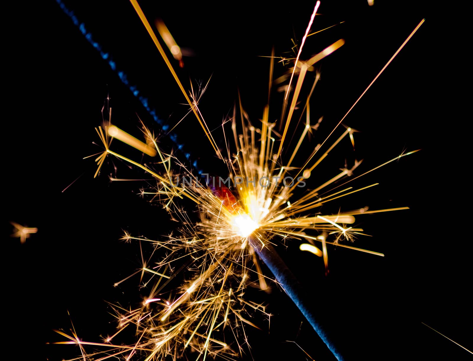 close-up of firework sparkler burning on black background, congratulation greeting  party happy new year,  christmas celebration concept