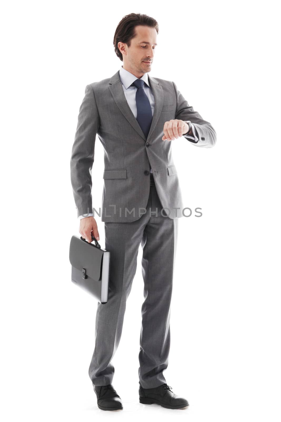 Full body portrait of young business man with briefcase isolated on white
