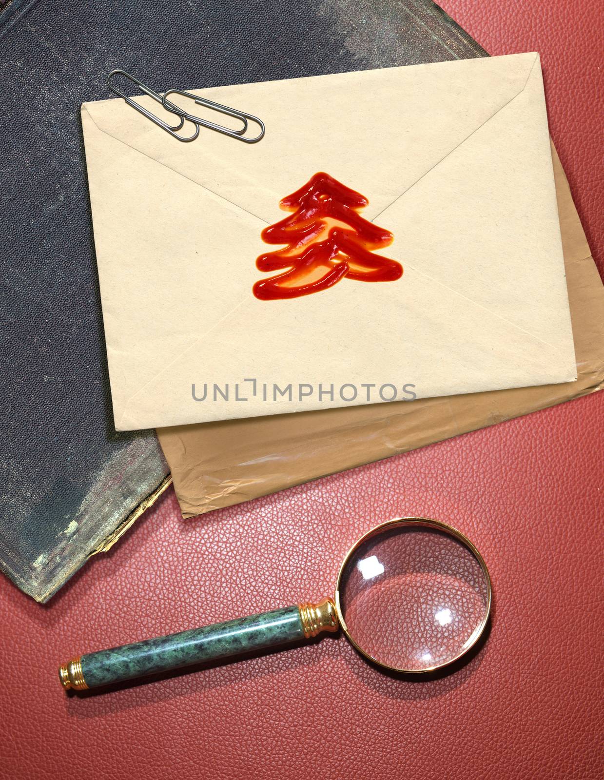 Christmas message with wax seal and other documentation on retro background