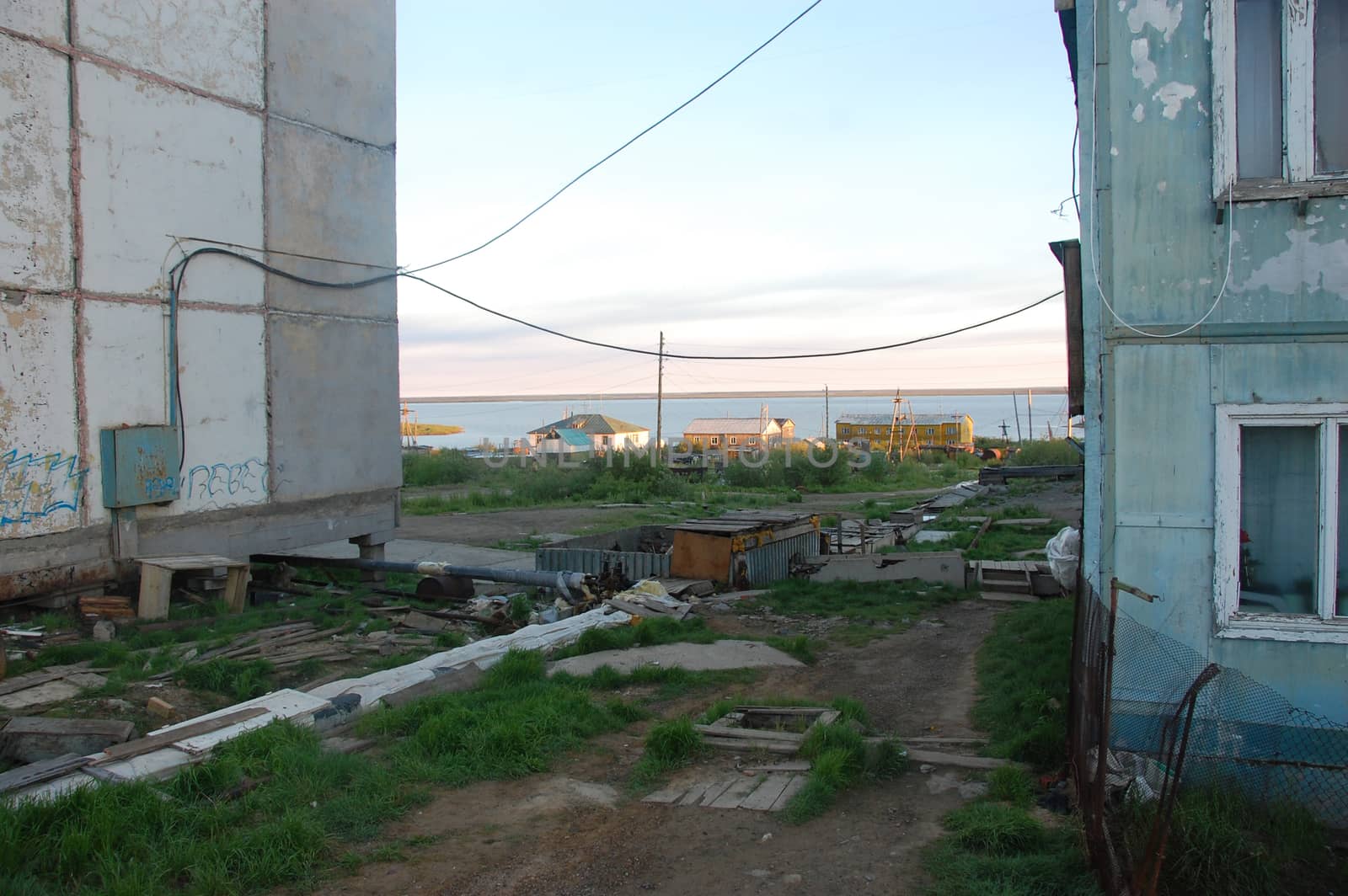 Houses of Chersky town at Kolyma river coast, Yakutia, Russia