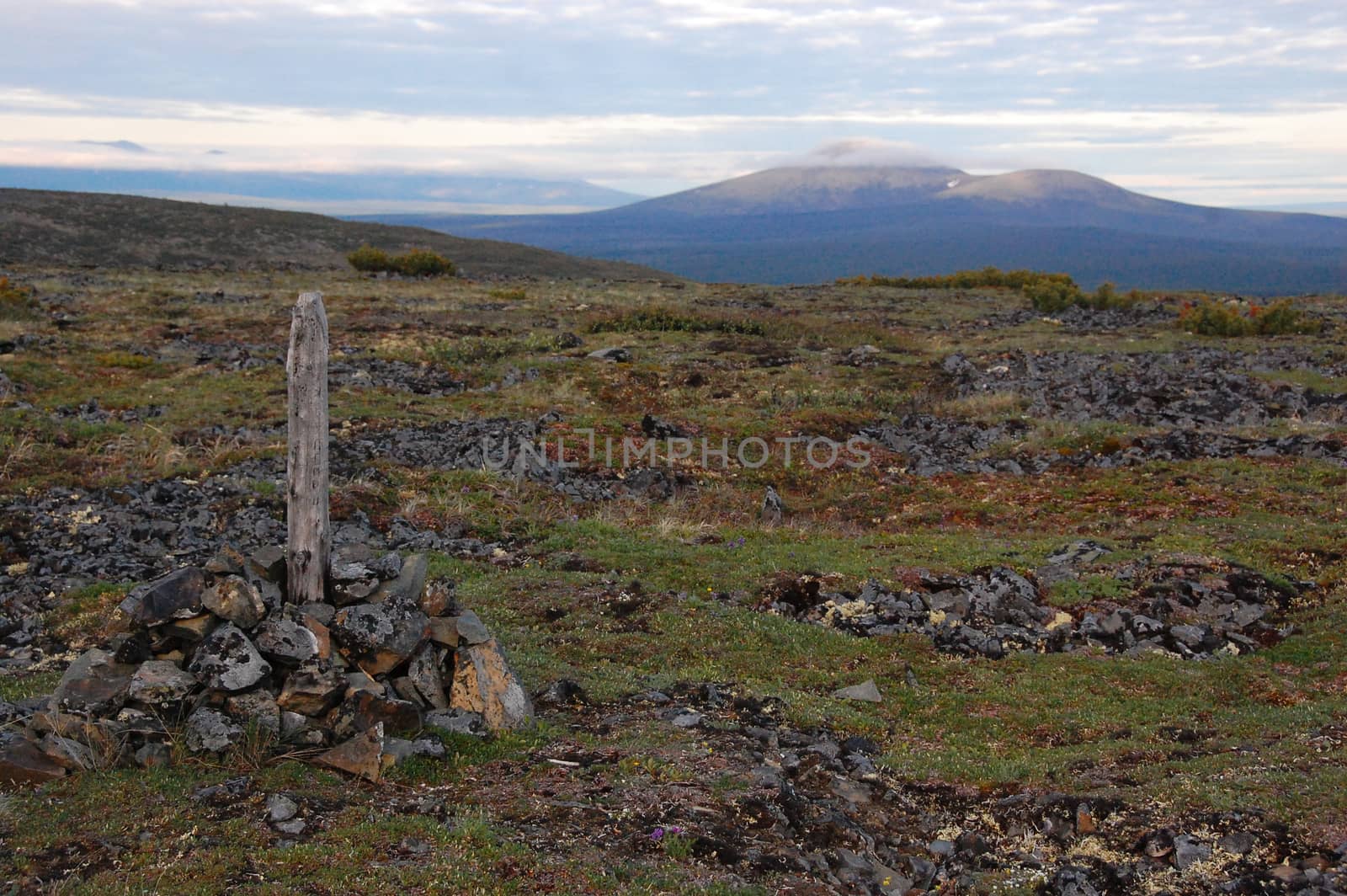 Ancient grave at top of mountain at Kolyma region by danemo