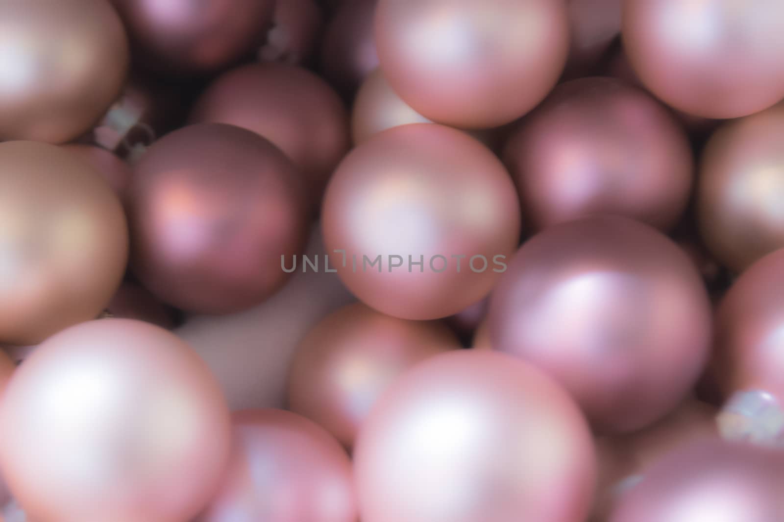 Background formed by pink balls for christmas tree.