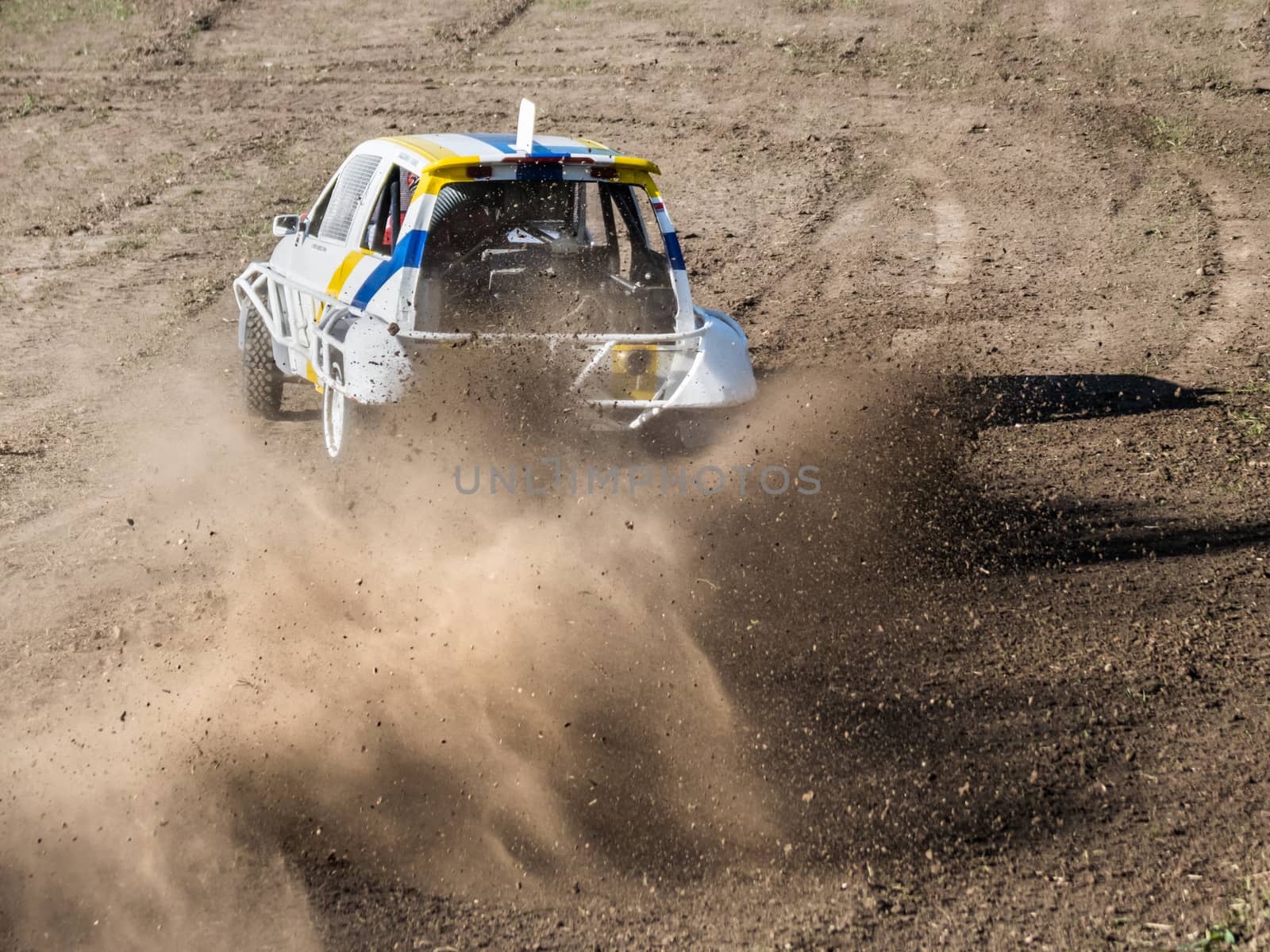 Car during a "stock car cross" race. The league called "stock car cross" foresees the use of tuned cars on unpaved circuits.