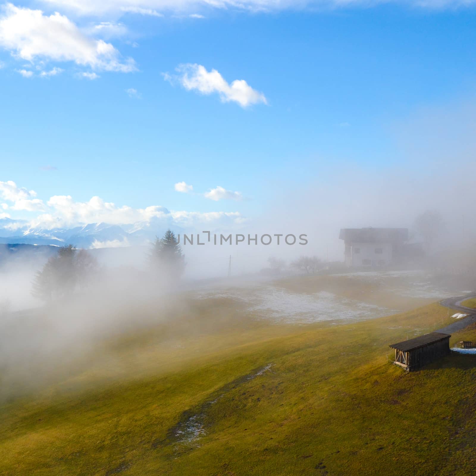 Mountain landscape shrouded in the morning fog.