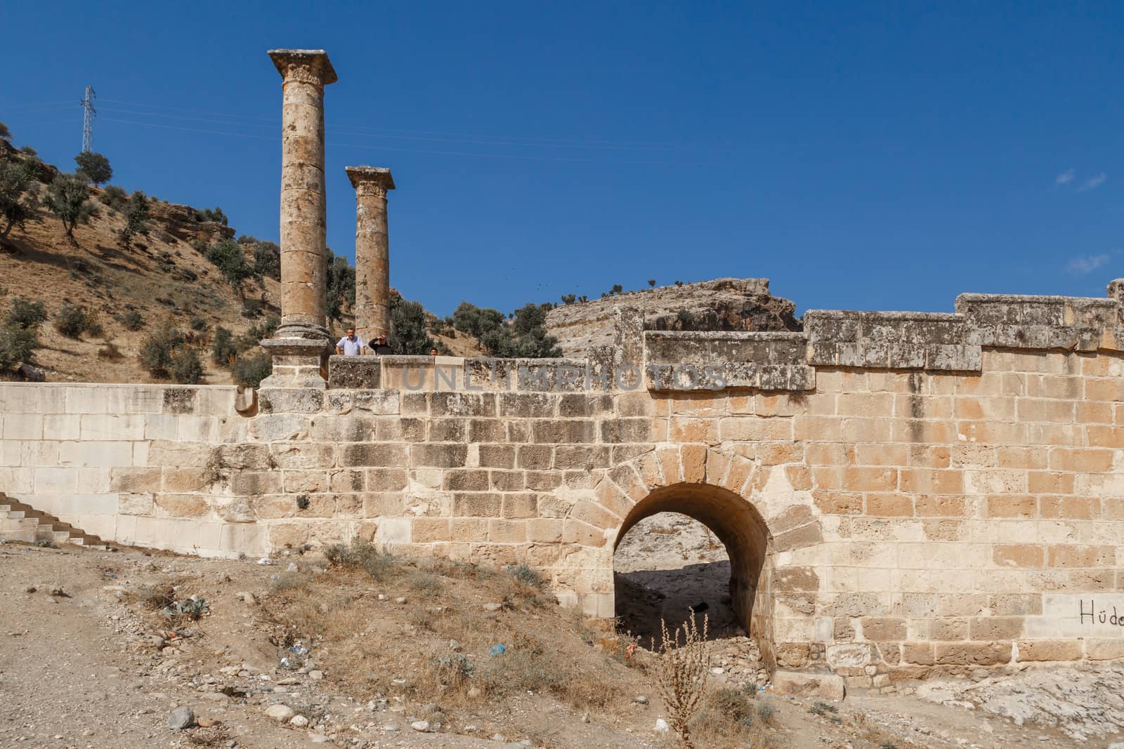 ADIYAMAN, TURKEY - AUGUST 24, 2015 : View of ancient historical Cendere Bridge, built in about 200 AC for Roma Imperiur Septimus Severus in Adiyaman.