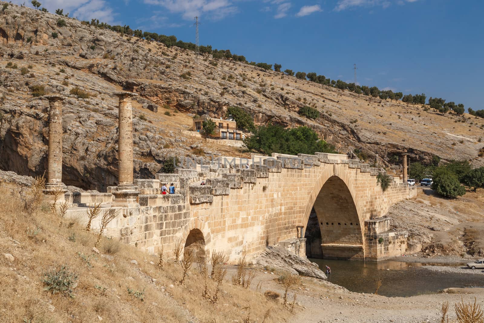 ADIYAMAN, TURKEY - AUGUST 24, 2015 : View of ancient historical Cendere Bridge, built in about 200 AC for Roma Imperiur Septimus Severus in Adiyaman.