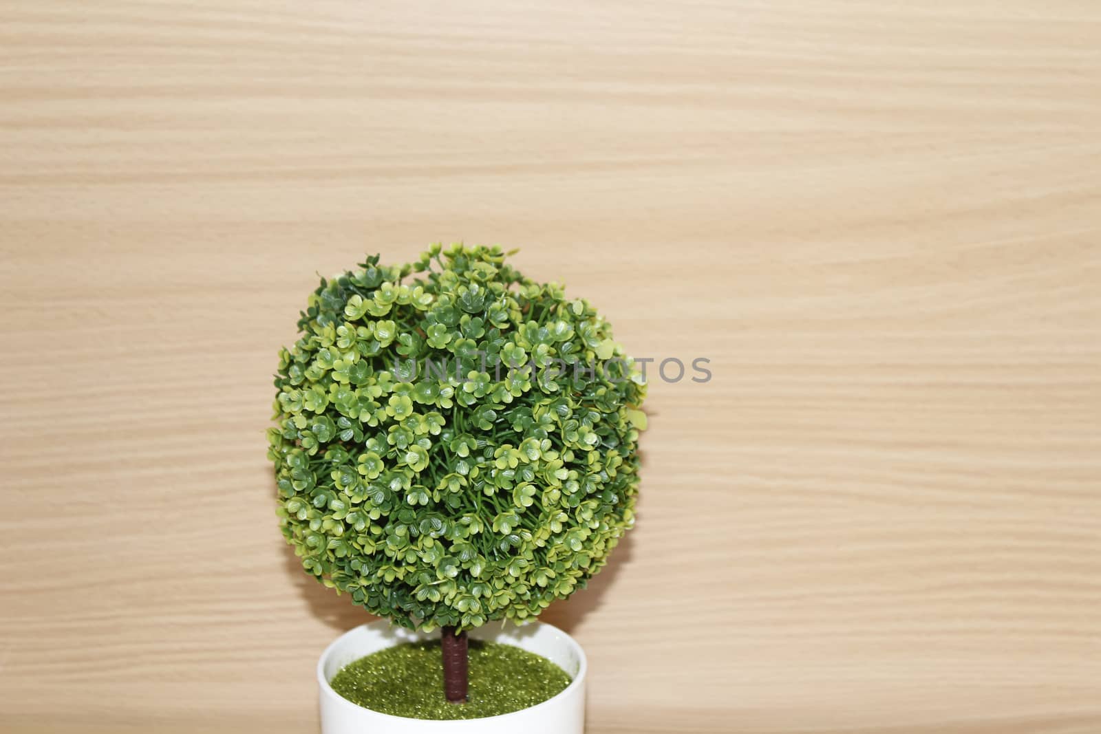 Plastic tree on table