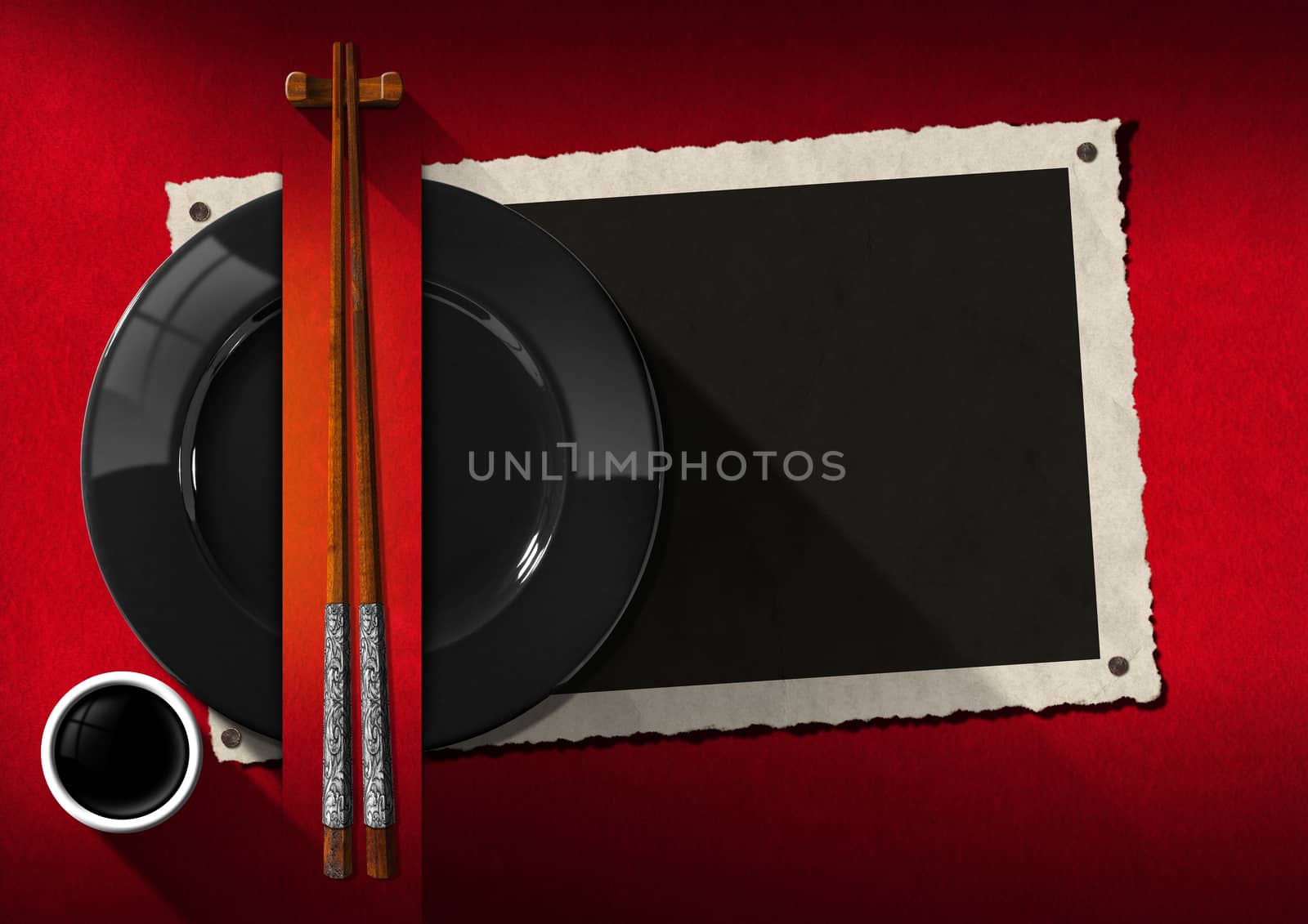 Empty photo frame with black plate, wooden and silver chopsticks, a cup of sauce. Template for an elegant Asian restaurant menu