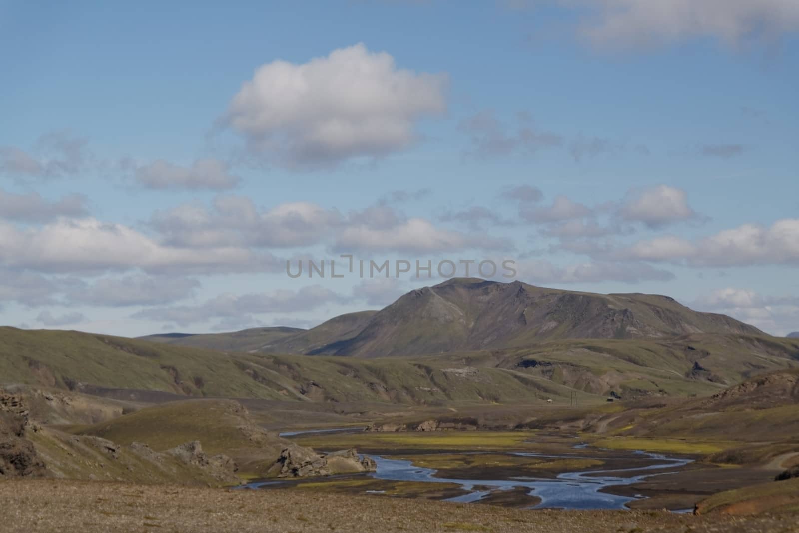 Landscape with old volcano and river in Iceland 