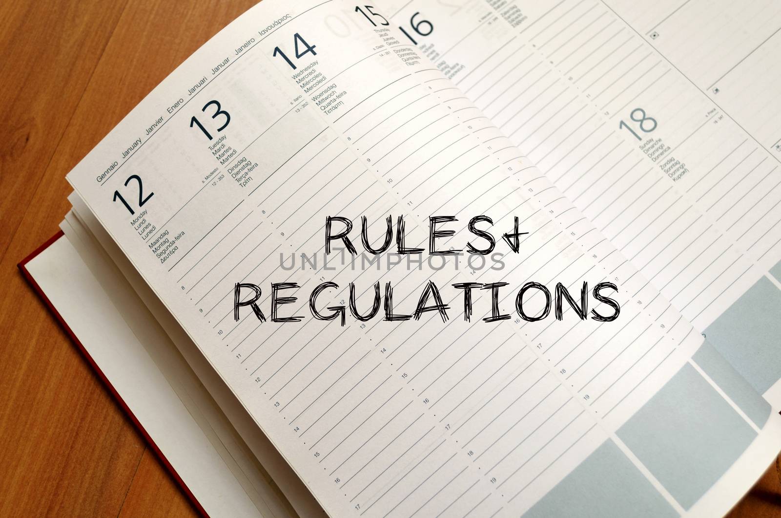 Rules and regulations text concept write on notebook