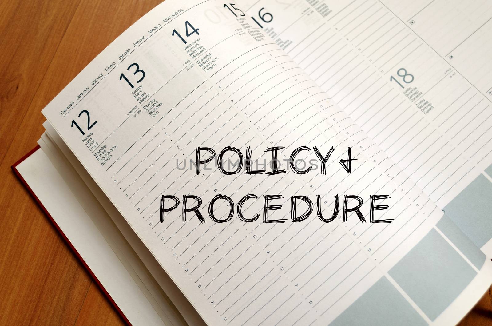 Policy and procedure text concept write on notebook