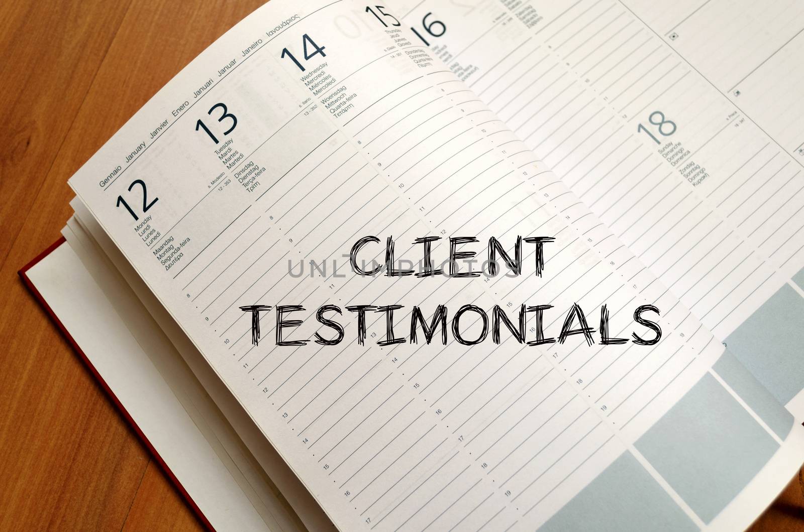 Client testimonials text concept write on notebook
