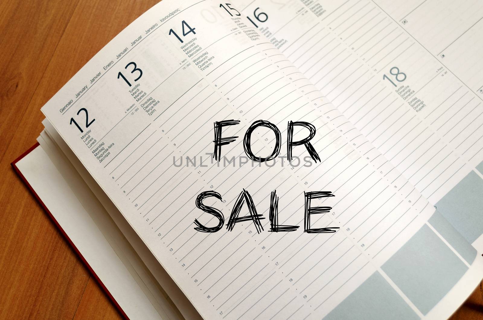 For sale text concept write on notebook with pen